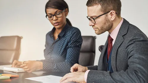 Two people working together