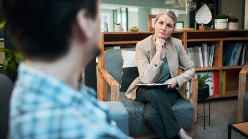 Woman having theraputic session with patient