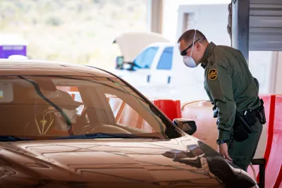 Border Patrol agents conduct operations at a highway checkpoint near Tucson, Arizona. 