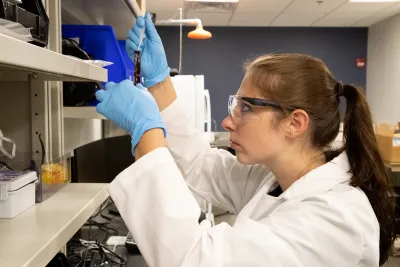 Scientists with CBP's Laboratories and Scientific Services conduct drug testing at the Port of Memphis Forward Operating Laboratory