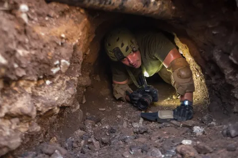 Border Patrol agent inspects a tunnel near Nogales, Ariz.